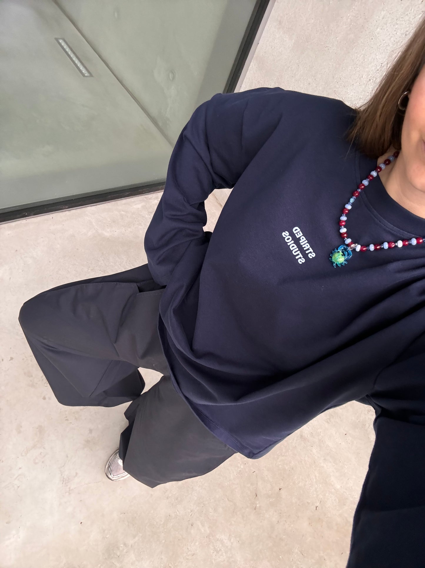 NAVY PLEATED TROUSERS